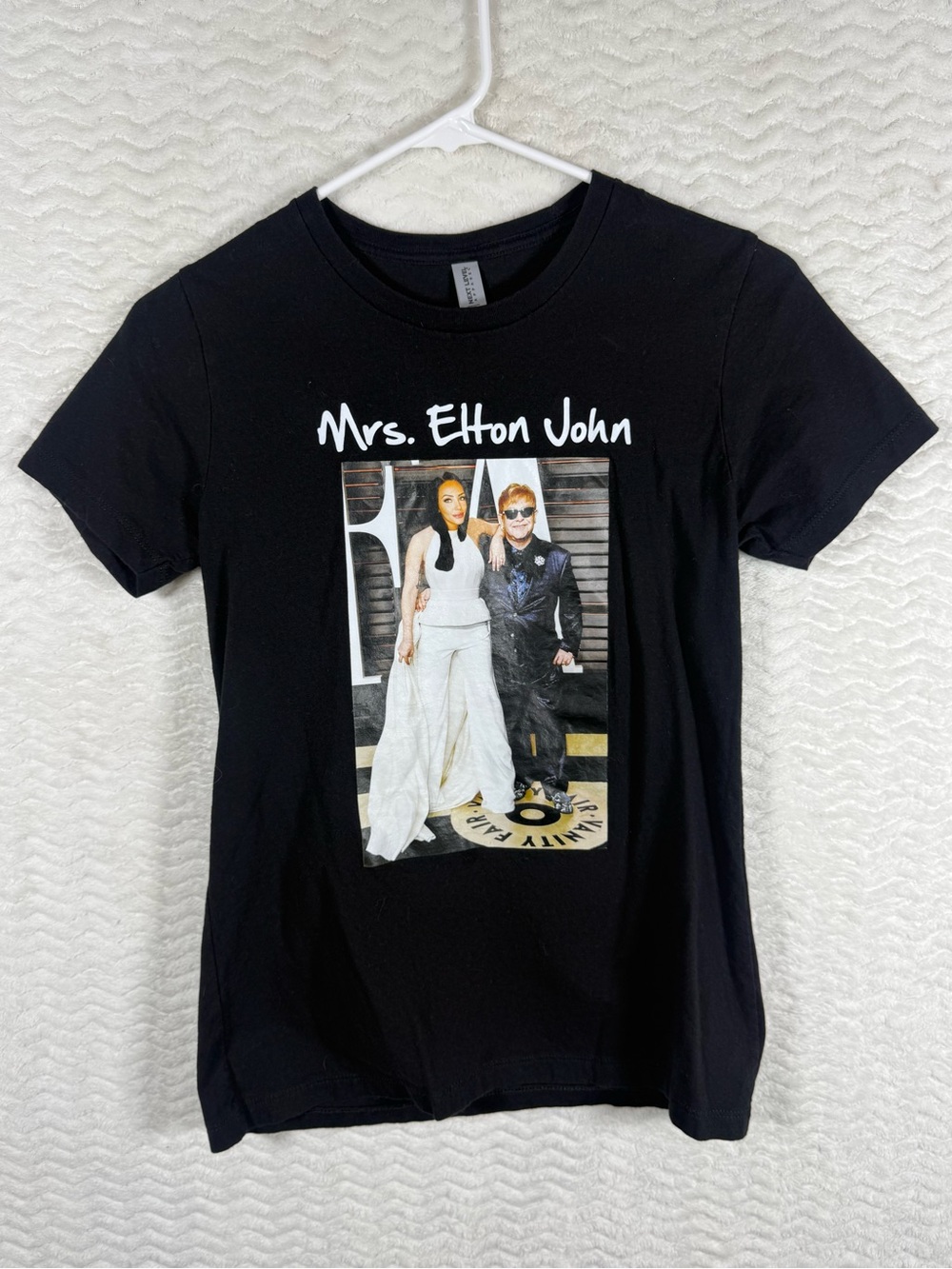 Mrs. Elton John’s - Next Level Apparel Black Tee with White Graphic 🔥🔥🧡